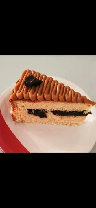 Produto Fatia Coco Com Ameixa Cobertura Doce De Leite